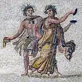 2nd-3rd century A.D., Seleucia Pieria. Maenad playing cymbala dances with satyr carrying syrinx (panpipes named for an Arcadian nymph pursued by Pan). Now at Hatay Archaeology Museum, Antakya, Turkey.