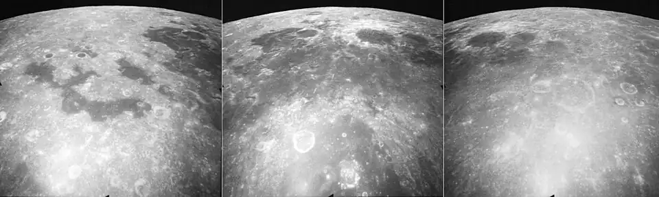 These are three views of Mare Marginis, taken by the mapping camera of the Apollo 17 mission in 1972, facing north-northeast from an average altitude of 124 km. At the right is the east side of Mare Marginis, with the craters Jansky, Jansky F, and the elongated Jansky D in the foreground, and the eastern mare is in the upper left. The center photo shows the central mare with the prominent crater Goddard surrounded by light materials, the crater Ibn Yunus immediately to its east, Goddard C to the west, half of the large crater Neper in the foreground, and the crater Hubble far to the north near the horizon. The swirls of light material in the mare, thought to be caused by magnetic fields, are visible in this photo. The left photo shows the western mare (more easily visible from Earth), with disconnected "lakes" of basalt, and the crater Cannon. These photos were taken within minutes of each other as the Command Module America orbited the Moon.