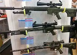 Gen 3, 4 & 5 Marine Scout Sniper Rifles on display.