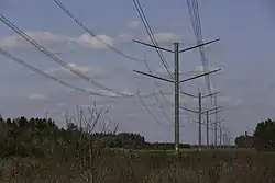 The high-voltage transmission line Kassø-Tjele at the road between Ejstrupholm and Brande