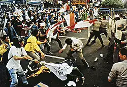 Image 52University students and police forces clash in May 1998 (from History of Indonesia)
