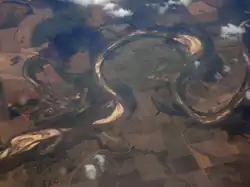 Oxbow bend in a river seen from an airplane.
