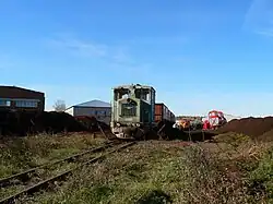 Locomotive TU4-2314 with freight train
