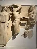 Metope from the Temple of Zeus, depicting the 11th labour of Hercules. In front of Hercules is Atlas and behind is Athena.