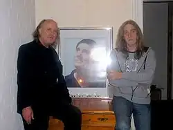 Scholz (left) and Wiedeke (right) with Köhler on the portrait in the background