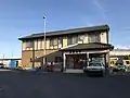 New station building with Shimbara Railway carriage (far right)