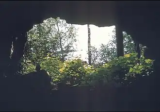 The mouth ok a cave, looking out.