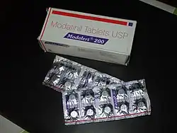 A package of Modafinil tablets