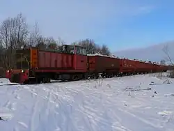 TU7A-3333 with freight train