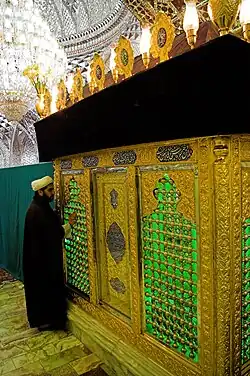 The grave of Hamzah (son of Mūsā al-Kāzim) with mirror work in the mosque