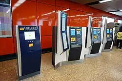 Ticket sales and Octopus card top-up machines in the unpaid area of the concourse. An Octopus Card Enquiry machine, used for checking transaction history, is seen at the left. (2017)