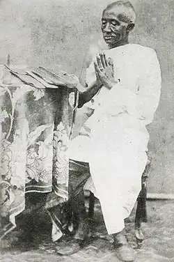 King Mongkut in the white robes of a lay renunciant