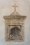 19-circle: A window at the southern apsis of the church of Preveli Monastery (Moni Preveli), Crete.