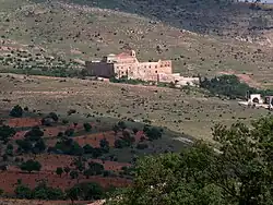Mor Hananyo Monastery with its farms in the background