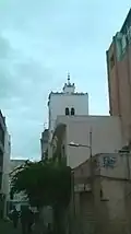 The minaret of the mosque seen from El Sabkha Street