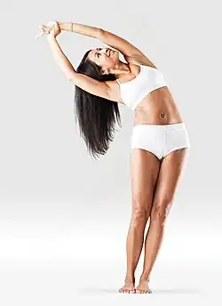 The side bend Indudalasana is known as "half moon pose" in Bikram Yoga.