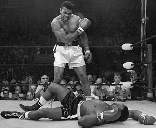 Muhammad Ali standing over Sonny Liston