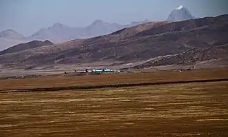 View across the border at PLA border output from Lo Manthang near Korala