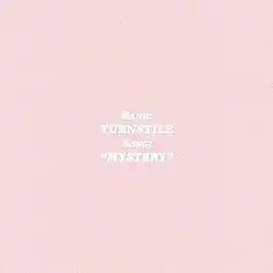 A static pink field with white text reading "Band: Turnstile Song: Mystery" written across the pink field.