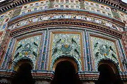 Terracotta plaques and stucco work at Buro Shiva temple