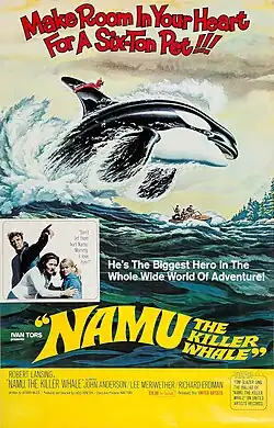 A film poster depicting an orca jumping out of the water over a small boat.