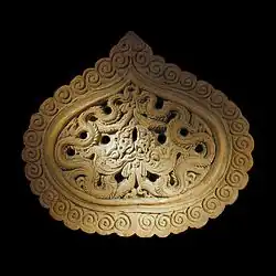 Bodhi tree leaf with dragon carving, a common decorative theme of Ly dynasty