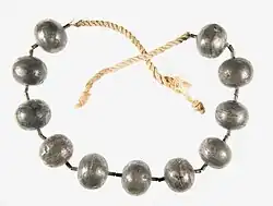 Metal beads on a plain string