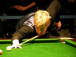 Neil Robertson playing a shot