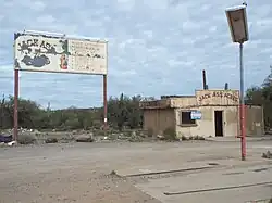 Full view of the Jack Ass Acres Service Station.