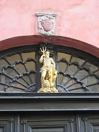 Detail of the Neptune figure above the gate.