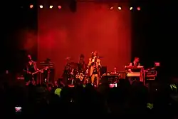 A photo of Nivek Ogre performing with ohGr in 2011.