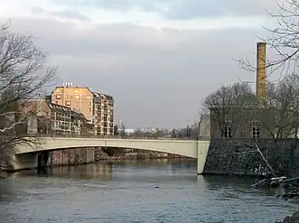 Market Street Bridge, looking downstream, with Brandywine Village on the left, and the Wilmington Pumping Station on the right. The bridge marks the approximate high level of tidewater on the Brandywine.