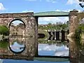 Northwich_-_Hunts_Weir_framed_by_railway_viaduct_-_geograph.org.uk_-_2902809