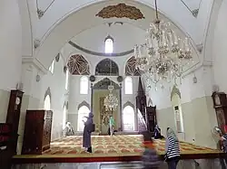 View of the interior, looking towards the qibla iwan and the mihrab