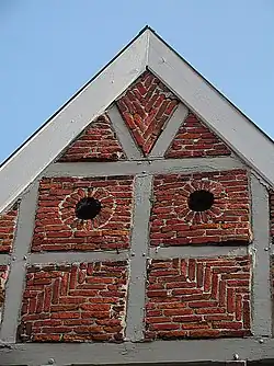 Decorative fired-brick infill with owl holes