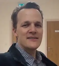 44-year-old man looking at the camera.