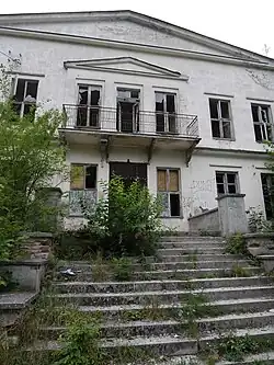 An abandoned 19th century residence in Kopytkowo. The graffiti on the newel signifies local allegiance to the football club Lechia Gdańsk