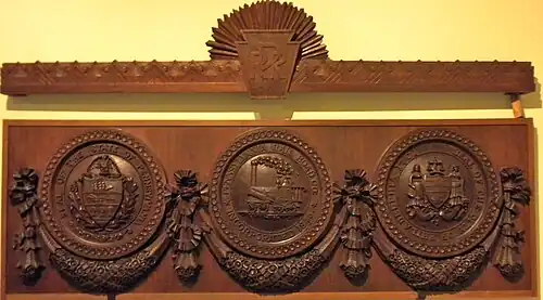 Seal of the Pennsylvania Railroad and coats of arms of Pennsylvania and the City of Philadelphia, from the PRR boardroom at the Broad Street Station. Now at the Railroad Museum of Pennsylvania.