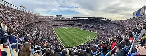 Image 1The official record attendance for a women's football match was set at Camp Nou on 22 April 2022, with 91,648 people watching Barcelona defeat Wolfsburg 5–1 (pictured). (from Women's association football)