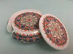 Very fine contemporary example of parchinkari from Agra, India. 19,444 semi-precious stones were individually cut and inlaid in white marble to create this item.
