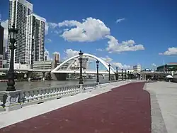The Pasig River Esplanade section near the Maestranza Wall in Intramuros. Shown in the background is the Binondo–Intramuros Bridge.