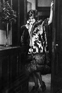 Publicity photograph of Bobadilla with her standing in a doorframe