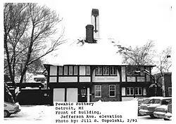 A building with a sign reading Pewabic Pottery