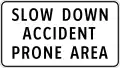 Slow down, accident prone area - Filipino road sign