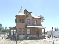 The Dougherty-Peterson House was built in 1899 and is located at 2141 W. Washington St. The house is listed as historic by the Phoenix Historic Property Register.