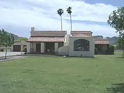 The Ralph H. Stoughton Estate house was built in 1930 and is located at 805 W. South Mountain Avenue. It was listed in the Phoenix Historic Property Register in May 1990 and in the National Register of Historic Places on July 3, 1986, reference #85001475. Boundary adjustments were made in June 2006. It was relisted in the Phoenix Historic Property Register in October 2010.