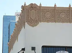 An ornament on the Welnick Arcade Grocery Store building.