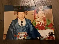 Lee-Gwang-yeong and his wife wearing traditional Korean wedding clothes