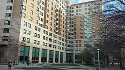 multi-story two-tone brown and light brown building