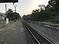 Station platform and track looking in the direction of Haruda. Note the disused platform and former track bed to the right. The siding can be seen to the left.